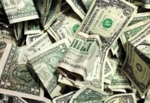 Repunta dólar arriba de 18.50 pesos tras anuncio de reformas