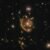 Astrónomos Hallan la Distancia a la Galaxia del Anillo Fundido de Einstein